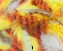 Hareline Magnum Cut Tiger Barred Zonkers - Funky Fly Tying -Fly Fishing Supplies Store Hareline Magnum Cut Tiger Barred Zonkers Black Orange Over Yellow 2