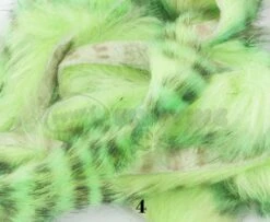 Hareline Tiger Barred Rabbit Zonker Strips - Funky Fly Tying -Fly Fishing Supplies Store Hareline Magnum Cut Tiger Barred Zonkers Mahi Green Black Over Chartreuse